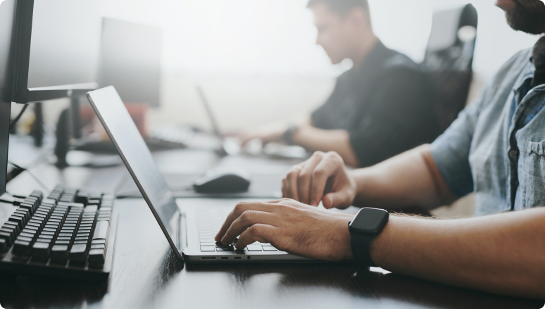 Men Working On Laptop